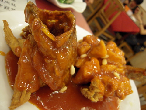 A fish that has "squirrel" in the dishname because of the hatchback pattern the body is cut in, then deep fried. It was covered in a ketchupy sauce and sprinkled in pine nuts. Not very fresh and pretty underwhelming, but fun to look at.