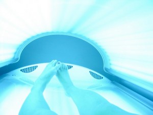 Lingbo gives herself skin cancer, or, tanning is fun.