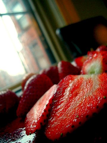 strawberries Strawberries awaiting slaughter - I especially like the rainy view outside the window.